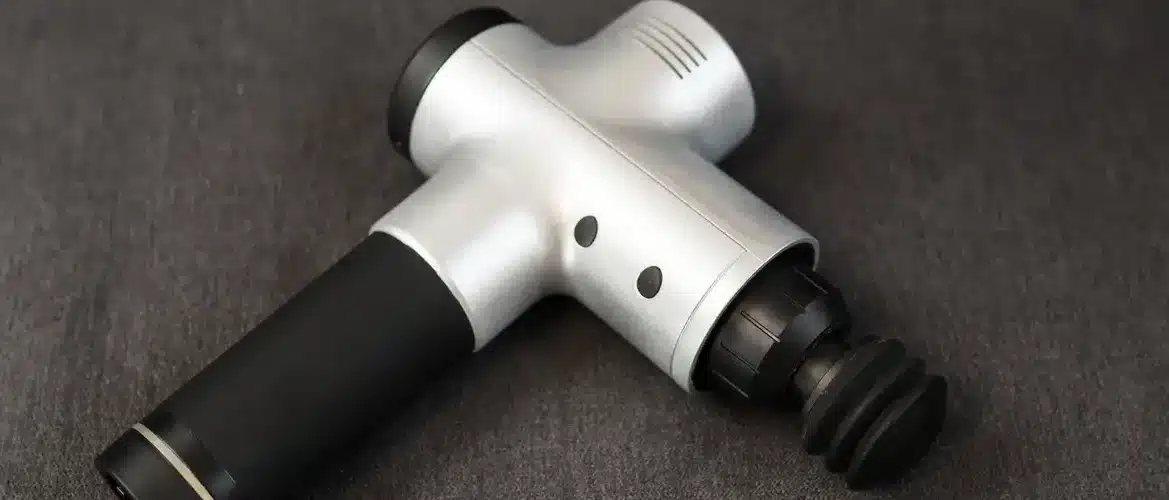 afbeelding van een massage gun met borstelmotor
