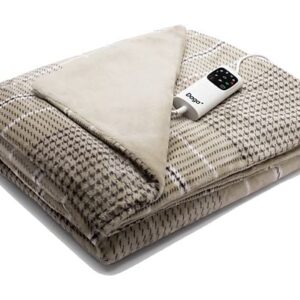 beige elektrische deken voor op de bank